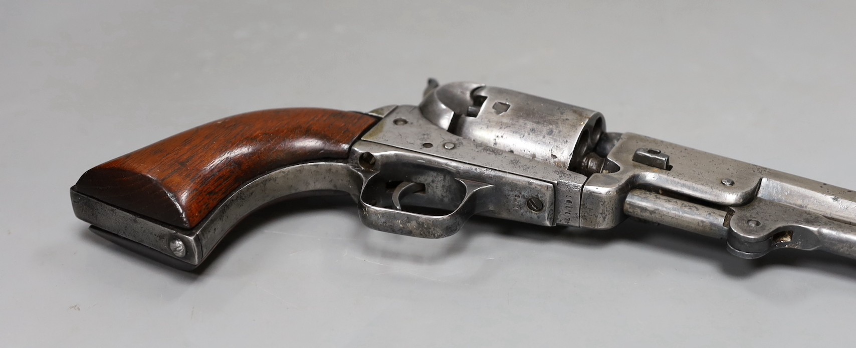 A Colt Patent revolver, under barrel loading, six shot, 7.5 inch octagonal barrel